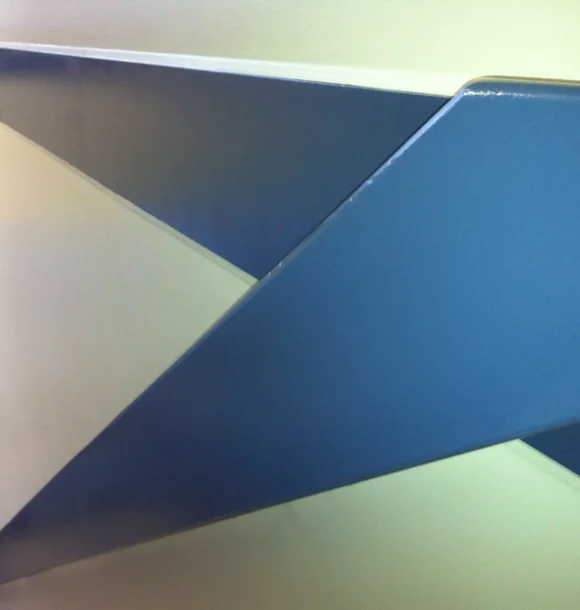 Modern office interior painting with geometric blue and cream walls. AZ Painting Ltd.
