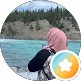 Woman in hijab photographs a scenic turquoise river and rocky cliff. AZ Painting Ltd.