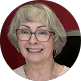 Smiling woman with glasses and short gray hair AZ Painting Ltd.